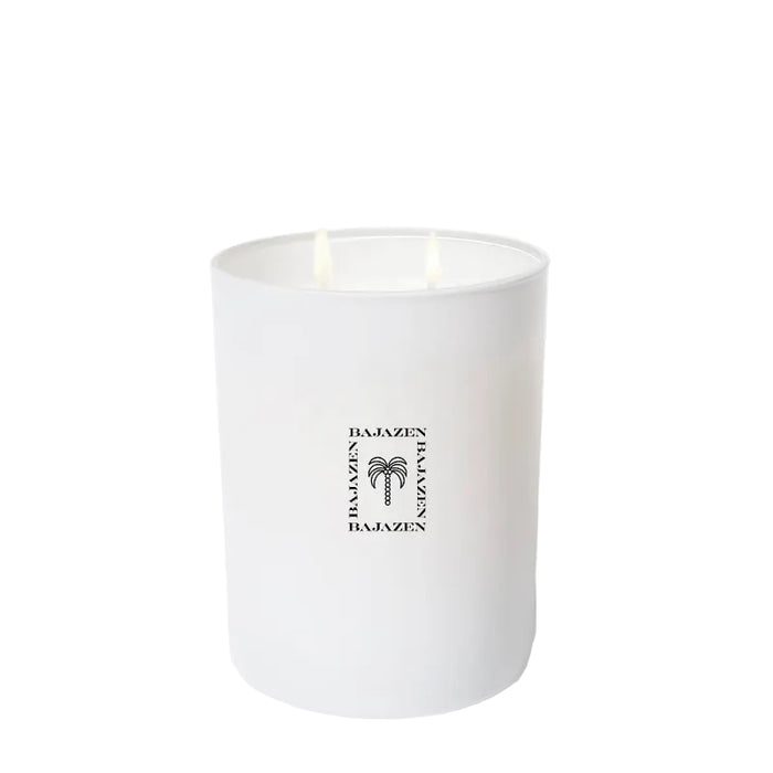 White candle with a brand logo on a white background