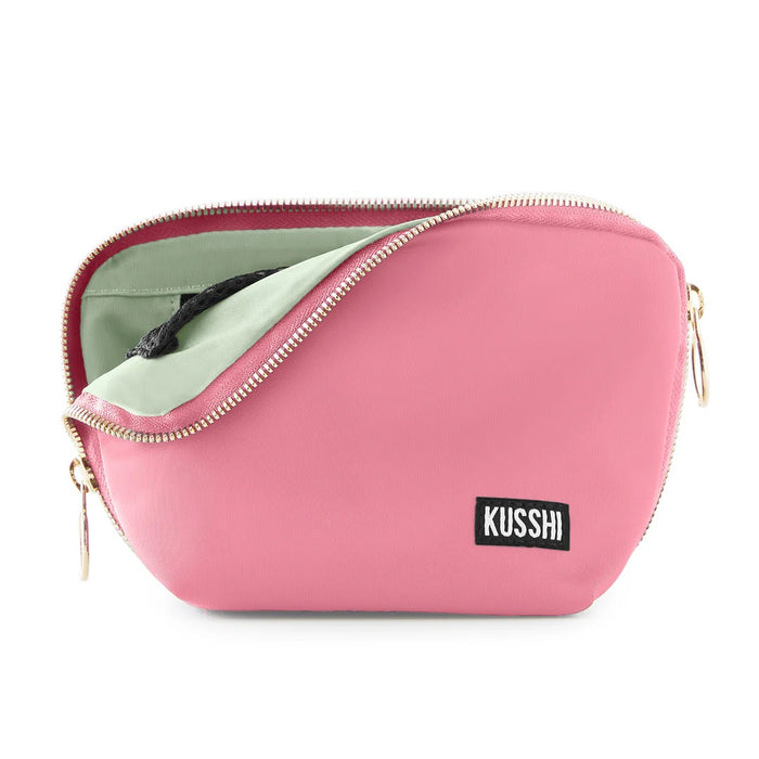 Sweat Pea Pink/Pistachio, Pink cosmetic bag with a gold zipper and 'Kusshi' brand logo on a white background