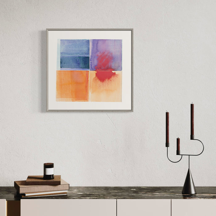 The artwork 'Penumbra' by Ken Schiano features a quadriptych watercolor composition with distinct color blocks. Upper panels showcase deep blue and purple-red hues, while lower panels transition through warm orange and peach tones. The abstract squares display subtle color bleeds and watercolor textures, framed in a minimalist gray frame, measuring 21x22 inches.